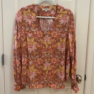 LOFT V-neck button front blouse.Long sleeves with elastic ruffle cuffs. Size-Med